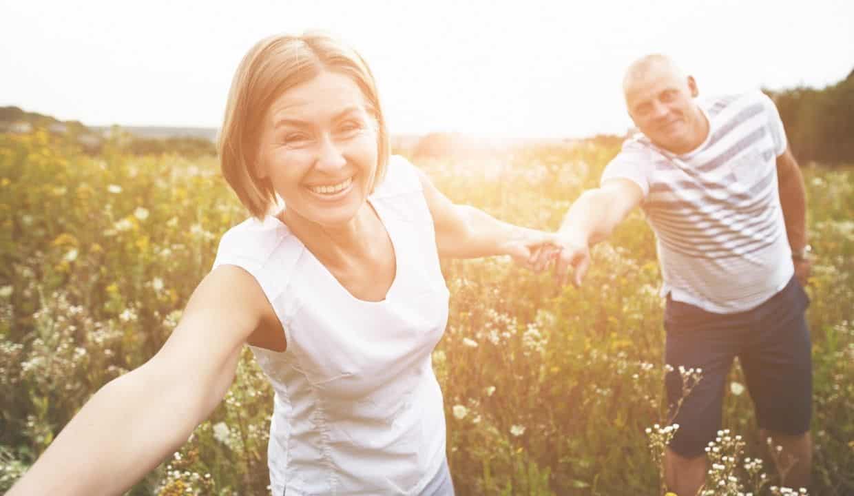 elderly couple on the field